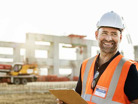 Architect builder smiling at the camera