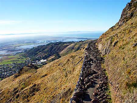 A view of aChristchurch cliff hill road damaged by an earthquake